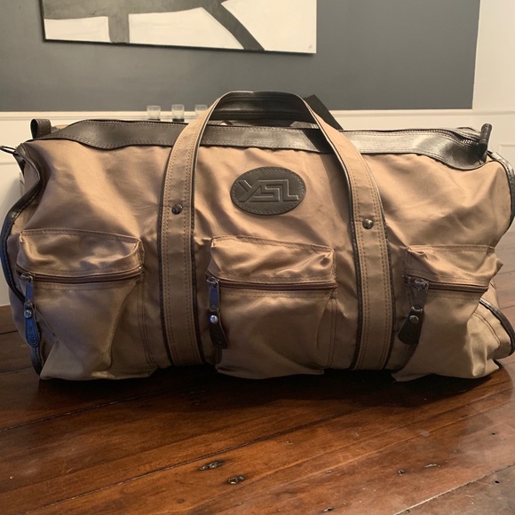 Yves Saint Laurent Handbags - Vintage Yves Saint Laurent duffel bag